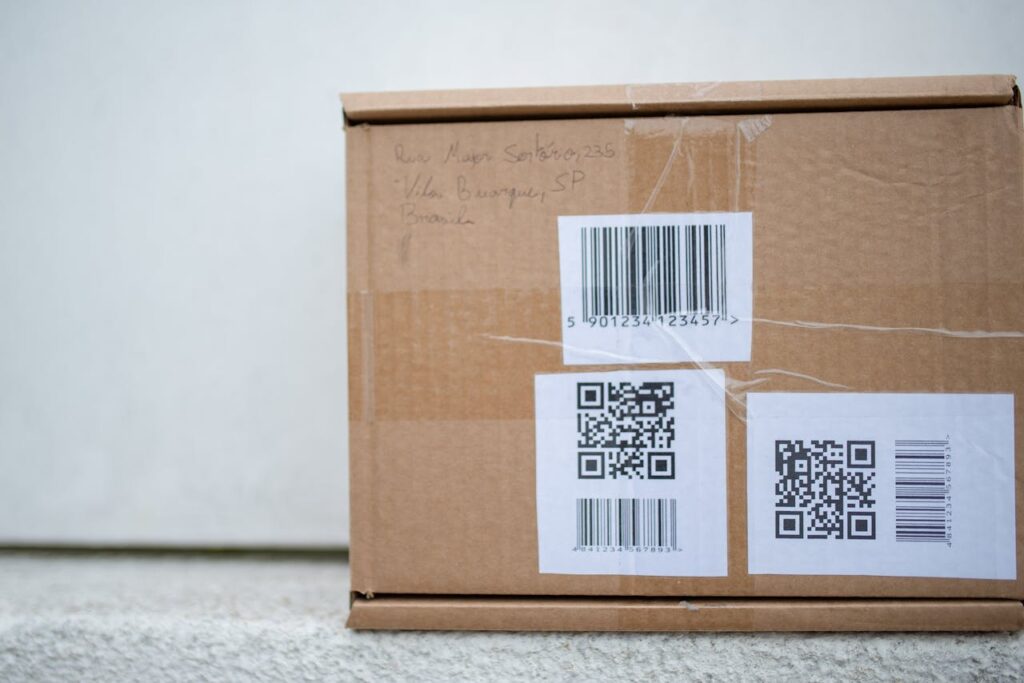 close-up-shot-of-a-delivery-package-7843978 Close-Up Shot of a Delivery Package